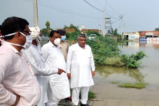 state minister anoop dhanak visits rainy water flooded village bithmada and rajali
