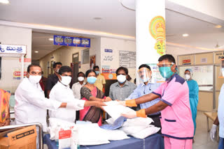 Siricilla ZP Chair Person Distributes PPE Kits And N95 Masks For Hospital Staff