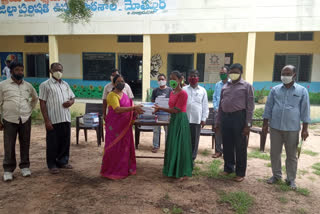 text books distributions to the govt school students at motkuru in yadadri bhuvanagiri district