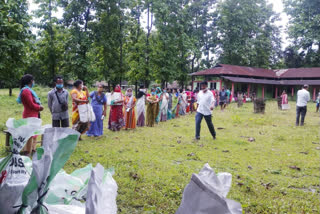 Food Relief Distribution at Jonai