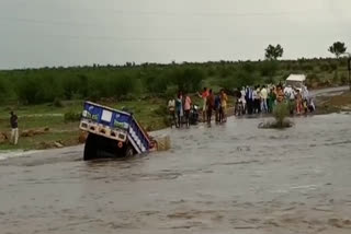 Tractor trolley swept away in the culvert