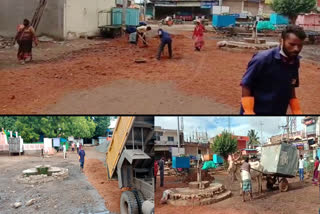 Municipal Staff Cleaning  of the Monument