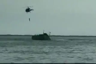 WATCH: Naval Helicopter rescues stranded fishermen from damaged fishing boat