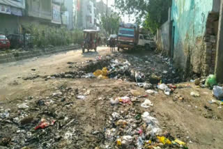 A pit built Pankha Road for throwing garbage is giving invitation to accidents