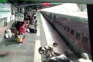 CCTV footage of a passenger being rescued in mumbai maharashtra