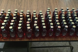 Seizure of Telangana liquor from a suspiciously wandering man in kurnool district