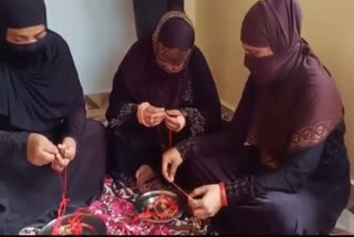 muslim women prepare rakhi