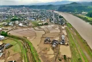 Flooding mudslides hit northern Japan