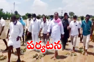 MLA krishna mohan reddy inspecting submerged crops at gadwal constitution