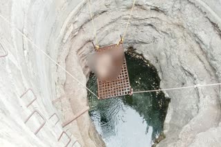 Woman's body in a well