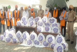Sarbatt Da Bhala Charitable Trust donates rations to Pathi Singhs at Gurdwara Manji Sahib Kot