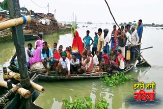 over capacity people ride on private boat in flood affected area in madhepura