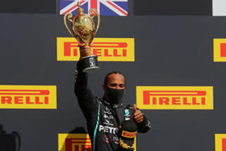 Hamilton limps to seventh British Grand Prix victory after late tyre drama