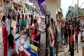 Shopkeepers selling sweets without wearing mask