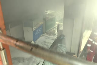 fire accident in mobile shop at vizainagaram