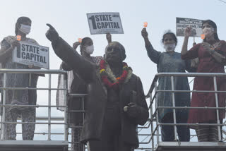 Women chanting Jai Amravati slogans at the Ambedkar statue at the corner of Guntur Lodge