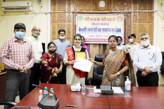 The collector honored the students who secured a place in the merit list of 12th