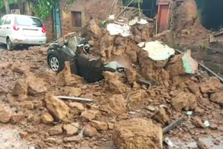 Rain in Belgaum The collapsed wall on the car