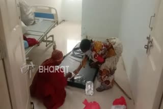 District hospital staff placed bed on floor for old age covid patient