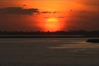 Sun sets in Ayodhya as devotees gather to perform aarti at the bank of Saryu river