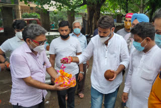 aap mla praveen kumar inaugurated road construction near veer savarkar shiv mandir marg