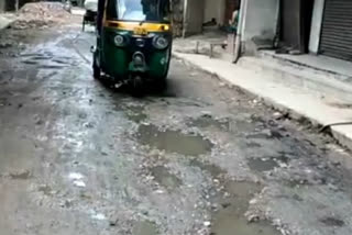 broken roads and dirty drains