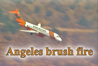 Crews battle brush fire north of Los Angeles