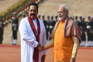 Mahinda Rajapaksa (left) and Indian PM Narendra Modi (file photo)