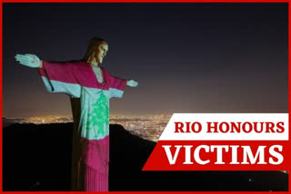 Rio Christ lit up to honor victims