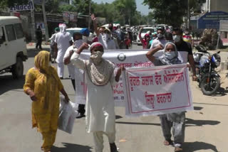 Pharmacy officers and rank-four employees of rural dispensaries stage protest march