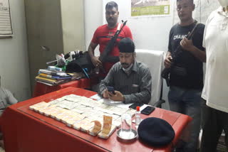 fake money seized at moirabari morigaon assam etv bharat news