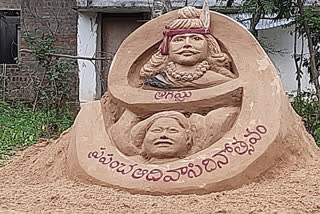 sand art statue made for international tribal day in amadalavalasa srikakulam district