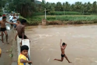 Children's jumping to river