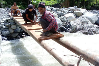 Villagers build bridges on their own in rain-hit Uttarakhand