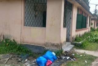 garbage with PPE kits in open air