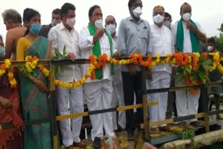 minister puvvada ajaykumar releasing water from paleru reservoir