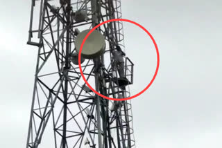 farmer climbed cell tower in karimnagar district