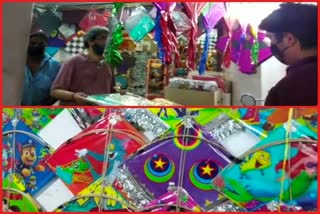 shops decorated with colorful kites in delhi