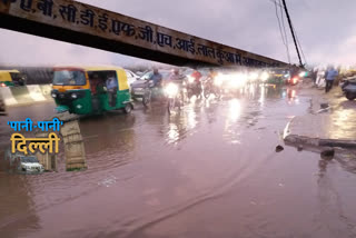 water on main road of Lal Kuan village