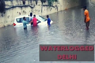Locals rescue man from car stuck in waterlogged underpass