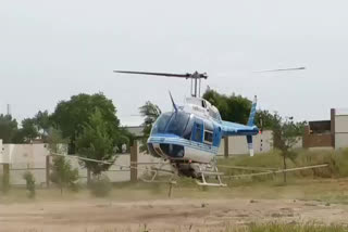 Spraying for locust control,  spray through helicopter