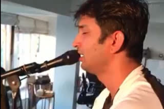 Sushant sings Krishna bhajan in a video