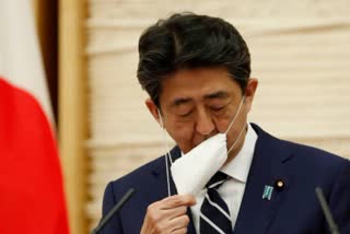 Japan's economy shrinks at record rate, slammed by pandemic