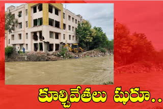 Demolition of illegal structures on drains in Warangal