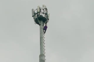 husband climbed onto cell tower for his wife in warangal