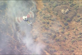 California  wildfires  pilot  Bell UH-1H  Coalinga  Central California  Los Angeles  ഹെലിക്കോപ്റ്റര്‍ തകര്‍ന്ന് പൈലറ്റ് മരിച്ചു  കാലിഫോര്‍ണിയ