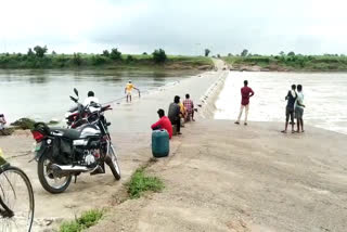 The villagers crossing the bridge are risking their lives