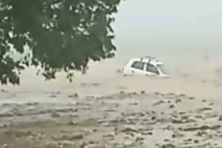 car swept away in drain at ramnagar