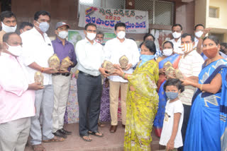 Medak Additional Collector Distributes Clay Ganapathi Idols