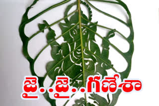 lord vinayaka art on ravi tree in guntur district